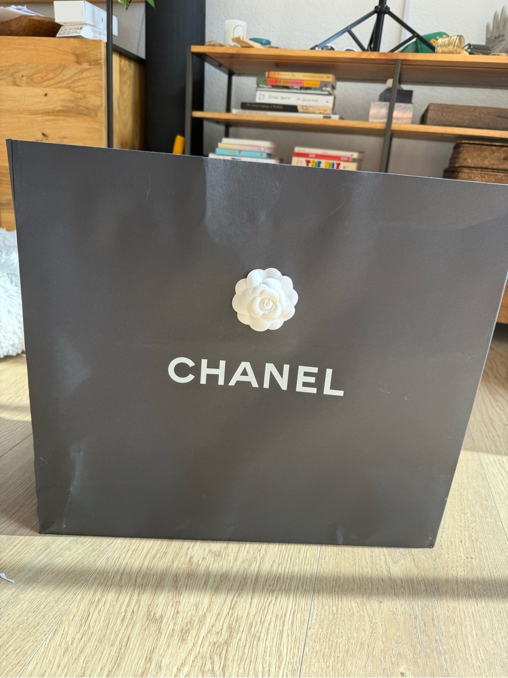 Authentic CHANEL Black and White shopping bag with Camellia Accents